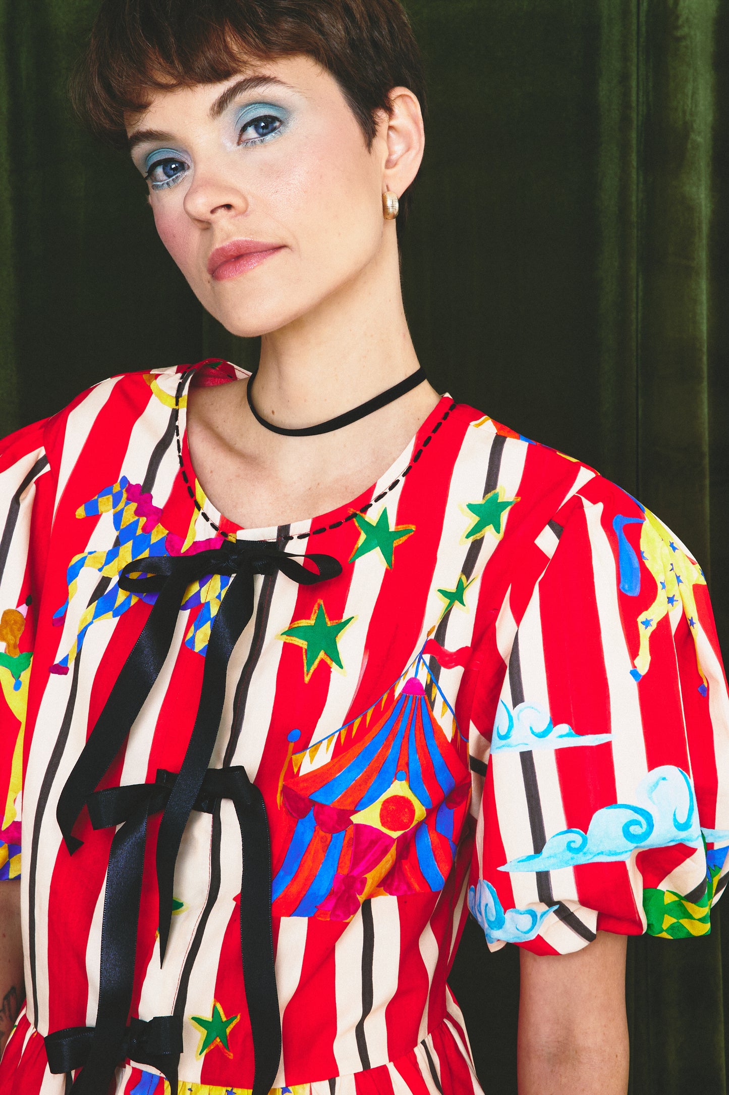 Blusa Isa - circo listra vermelha